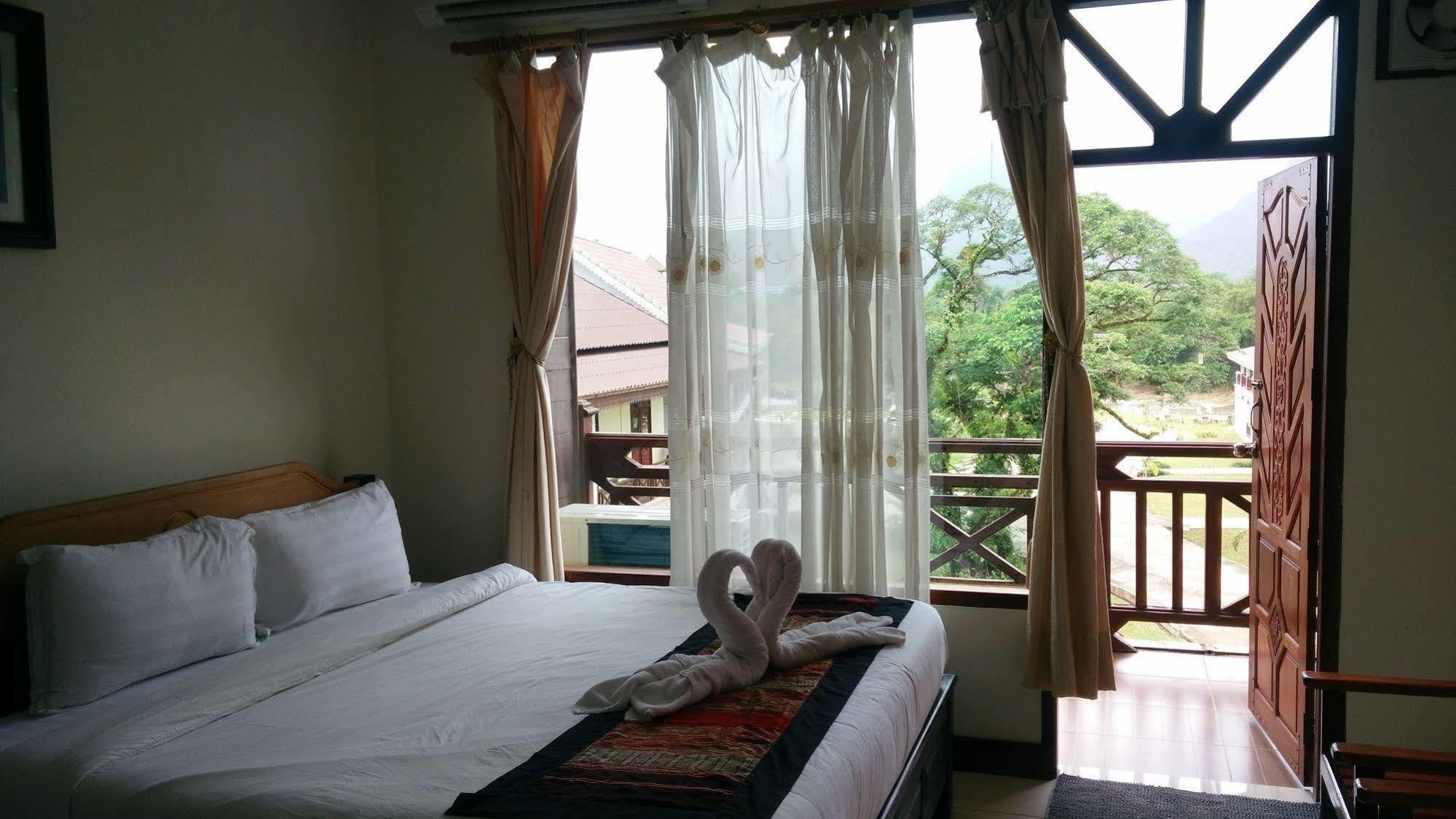 Thavisouk Riverside Hotel Vang Vieng Buitenkant foto